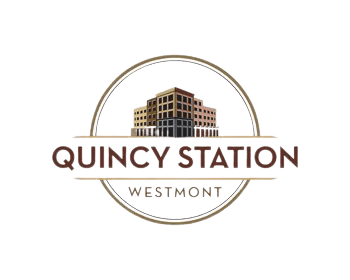 The image is of a logo for Quincy Station Westmont.